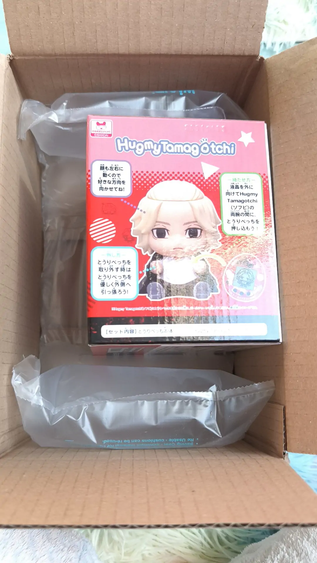 Tokyo Revengers Hugmy Tamagotchi + figurka Manjiro Support fotografii produktu