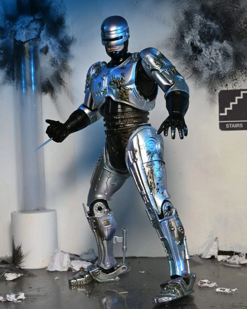 Akční figurka RoboCop Ultimate Battle Damaged RoboCop s křeslem 18 cm fotografii produktu